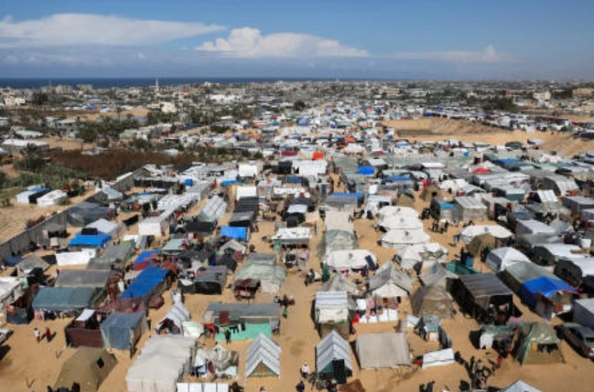 Displaced Palestinians, who fled their houses due to Israeli strikes, take shelter in a tent camp, amid the ongoing conflict between Israel and Hamas, in Rafah, on Feb. 14, 2024. (Reuters)