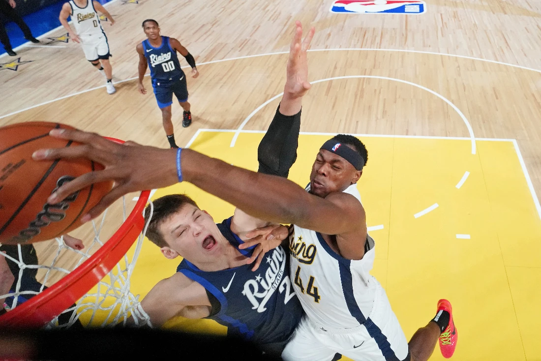 Team Detlef center Oscar Tshiebwe of the Indiana Mad Ants dunks against Team Jalen center Walker Kessler of the Utah Jazz during a Rising Stars semifinal at Gainbridge Fieldhouse. (Supplied)