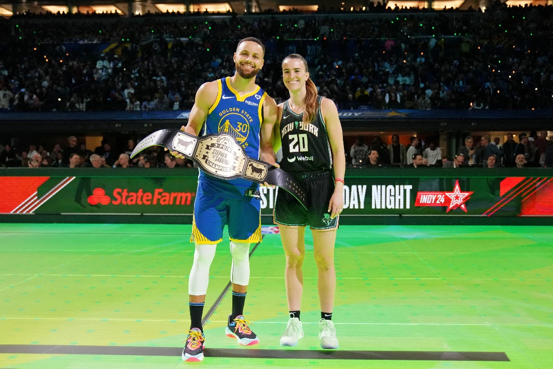 Golden State Warriors guard Stephen Curry and New York Liberty guard Sabrina Ionescu after the Stephen vs. Sebrina three-point challenge during NBA All-Star at Lucas Oil Stadium. (Supplied)