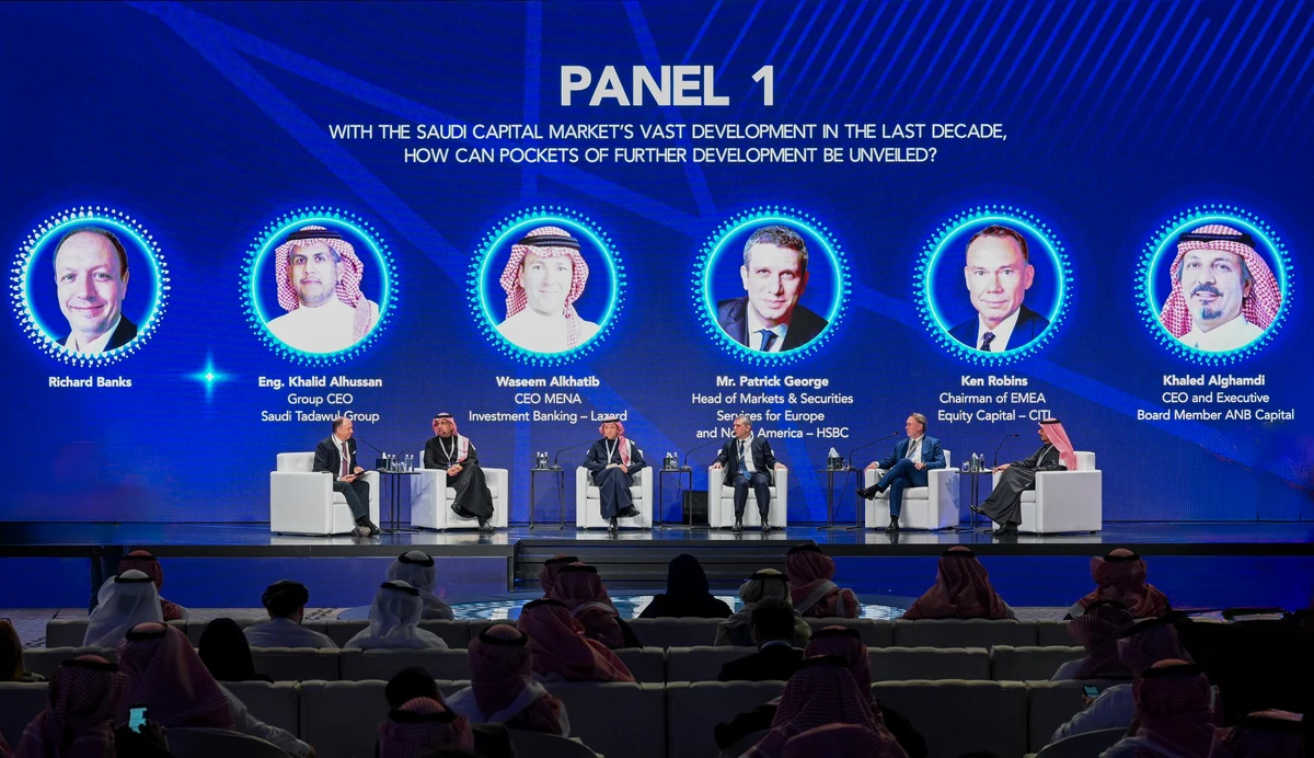 Top officials and experts discuss the development of the financial sector during a panel discussion at the forum last year. File