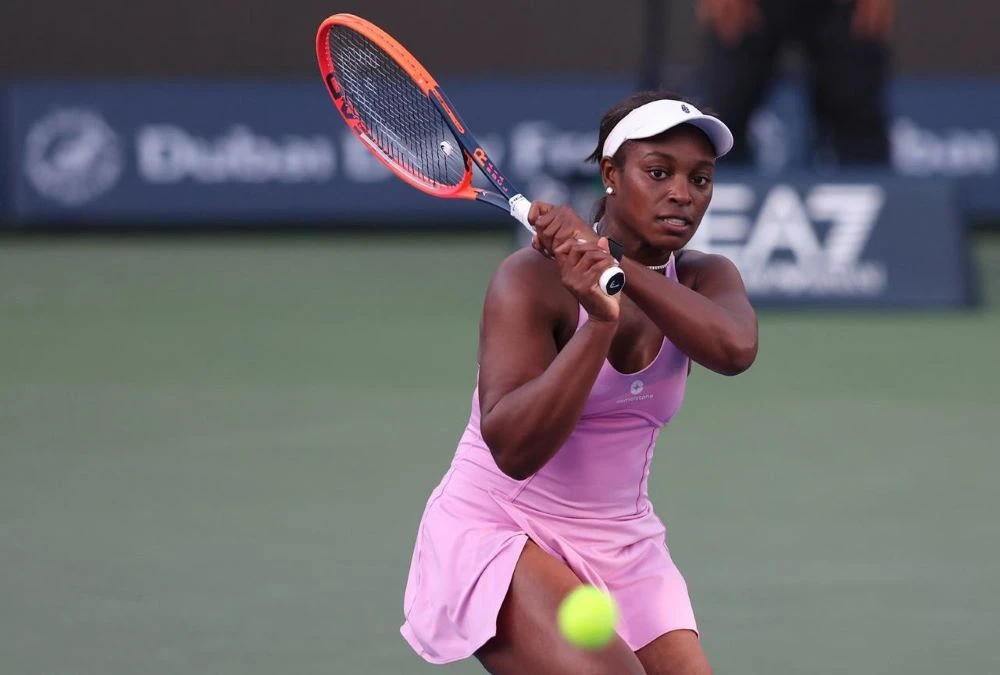 Sloane Stephens of the US serves to Clara Burel of France during a match at the Dubai Duty Free Tennis Championships in Dubai, UAE, Sunday, Feb. 18, 2024. (Supplied/Dubai Tennis Championships)