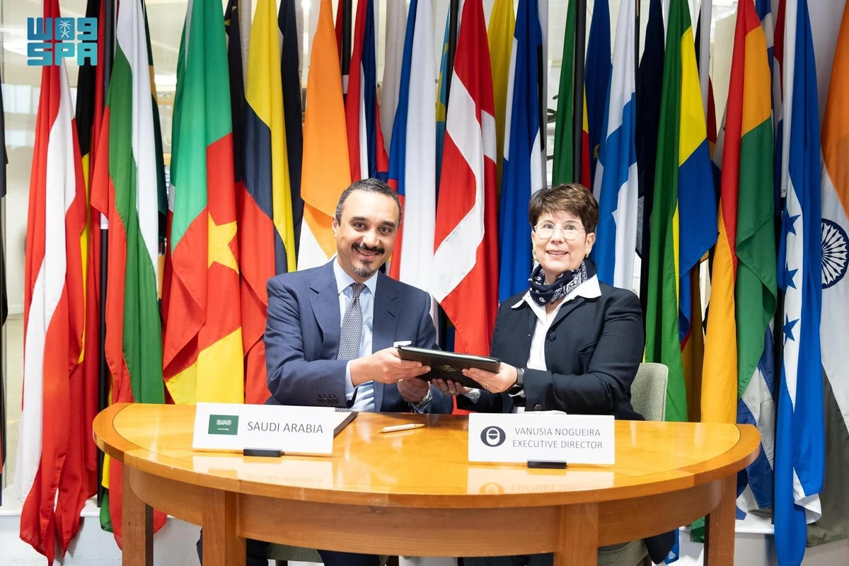 The Kingdom’s ambassador to the UK Prince Khalid bin Bandar signs the International Coffee Agreement 2022 in London on Tuesday. (SPA)