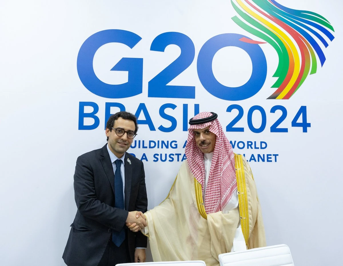 Saudi Foreign Minister Prince Faisal bin Farhan with his French counterpart Stephane Segournet in Rio de Janeiro.