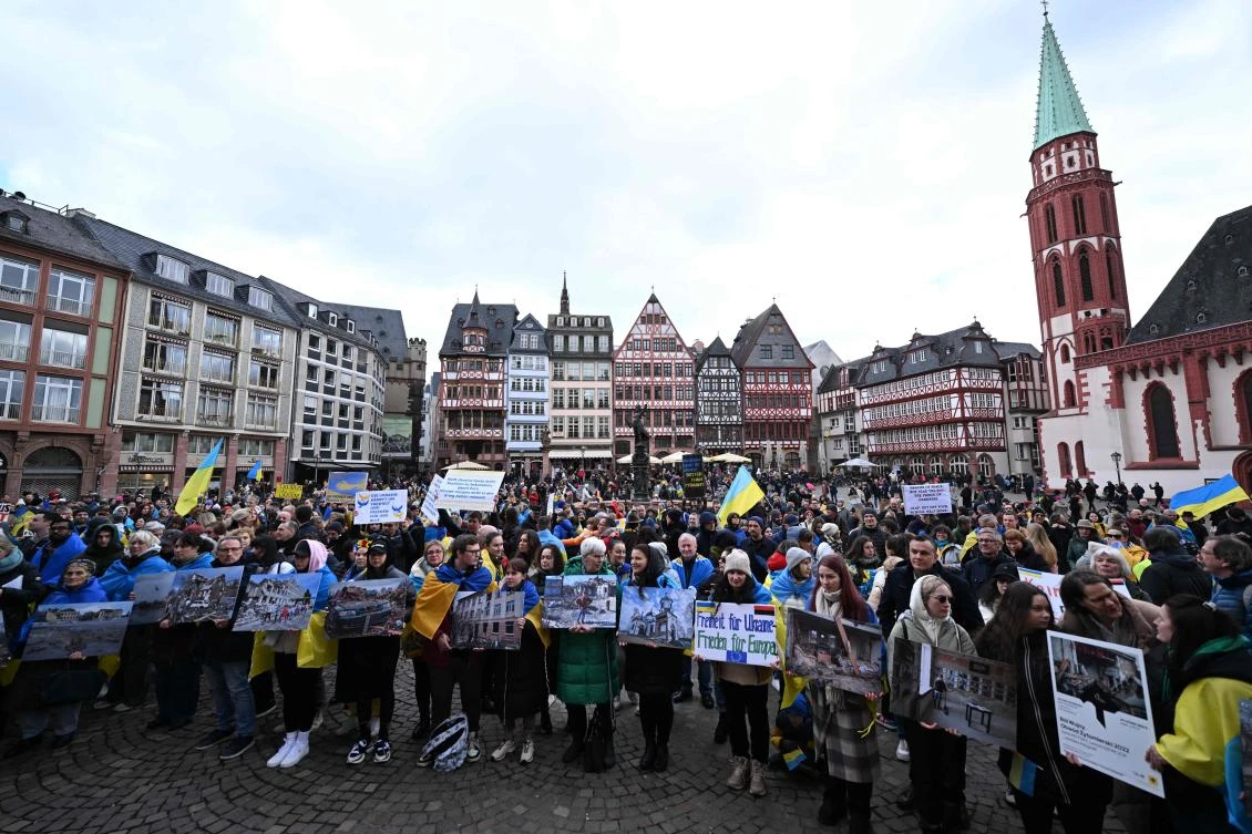 Demonstrators take part in a rally in support of Ukraine, to mark the second year of Russia’s military invasion on Ukraine, in Frankfurt on Feb. 24, 2024. (AFP)