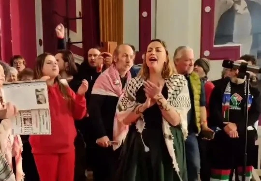 Welsh singer-songwriter Charlotte Church led a 100-strong choir singing “From the River to the Sea” during a pro-Palestine fundraising concert at a village hall in Caerphilly, South Wales, on Saturday. (Instagram)