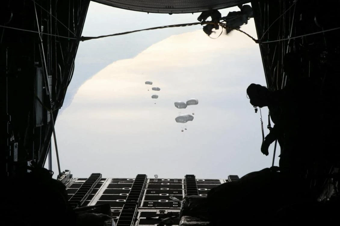 A Jordanian military aircraft drops humanitarian aid over the southern Gaza Strip, amid the ongoing conflict between Israel and Hamas. (AFP)