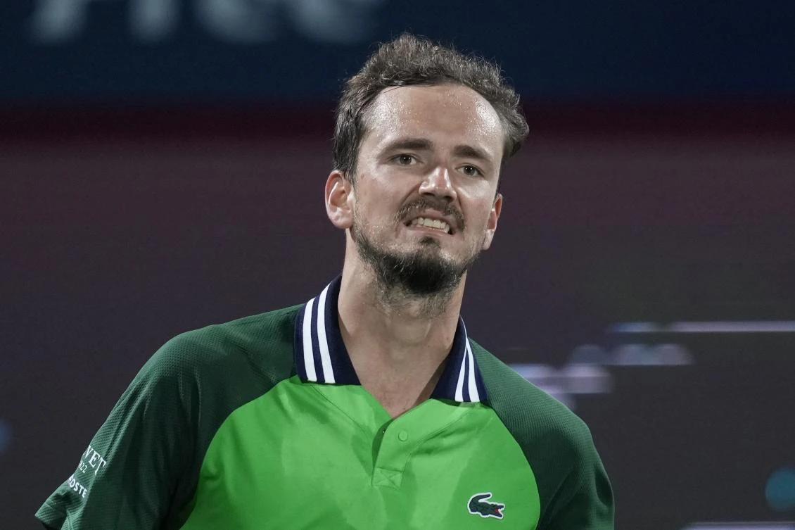 Daniil Medvedev celebrates after beating Alexander Shevchenko of Kazakhstan during a match of the Dubai Duty Free Tennis Championships in Dubai on Feb. 27, 2024. (AP)