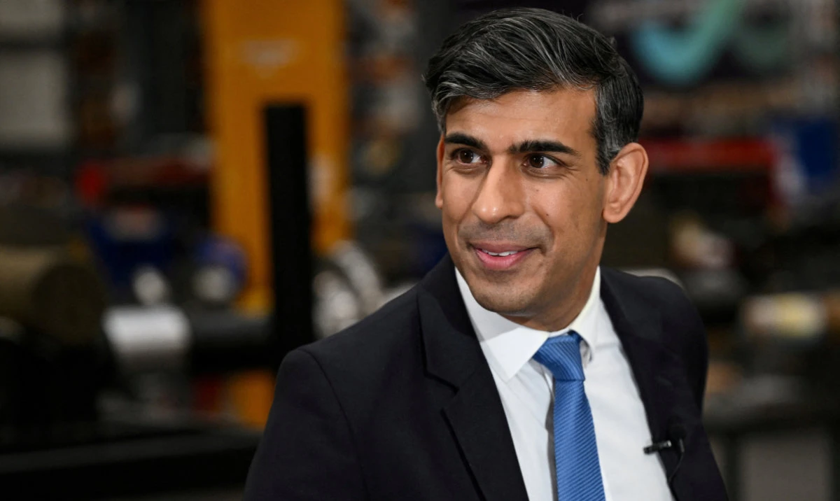Britain's Prime Minister Rishi Sunak reacts as he speaks during an interview following a visit in the Siemens Mobility factory, in Goole, in East Yorkshire, Britain February 26, 2024. (Reuters)