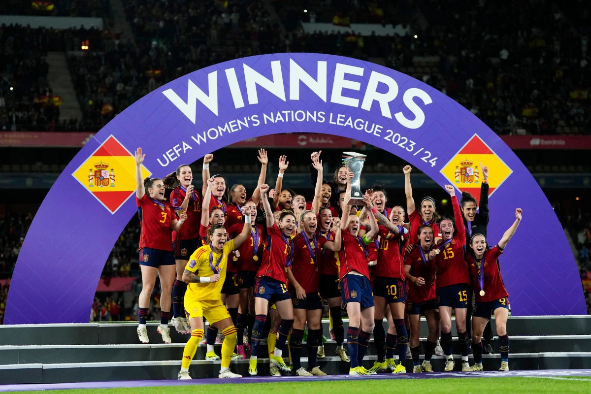 Spain's team captain Irene Paredes lifts the trophy after winning the Women's Nations League final between Spain and France at La Cartuja stadium in Seville, Spain,on Feb. 28, 2024. (AP)