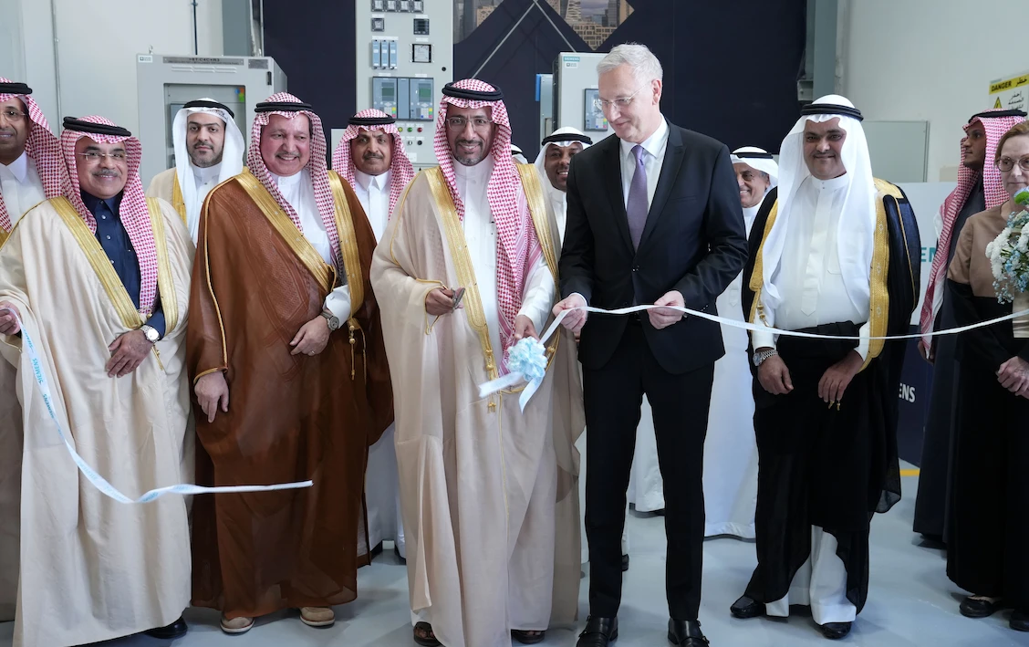 Saudi Minister of Industry and Mineral Resources Bandar Alkhorayef cutting the ribbon on the new Siemens factory.
