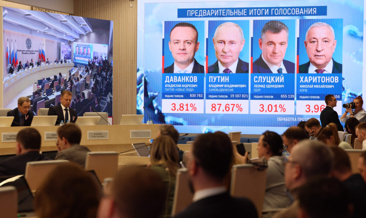 Analysts believe that Putin may get about 80 percent of the votes this time. (AFP)