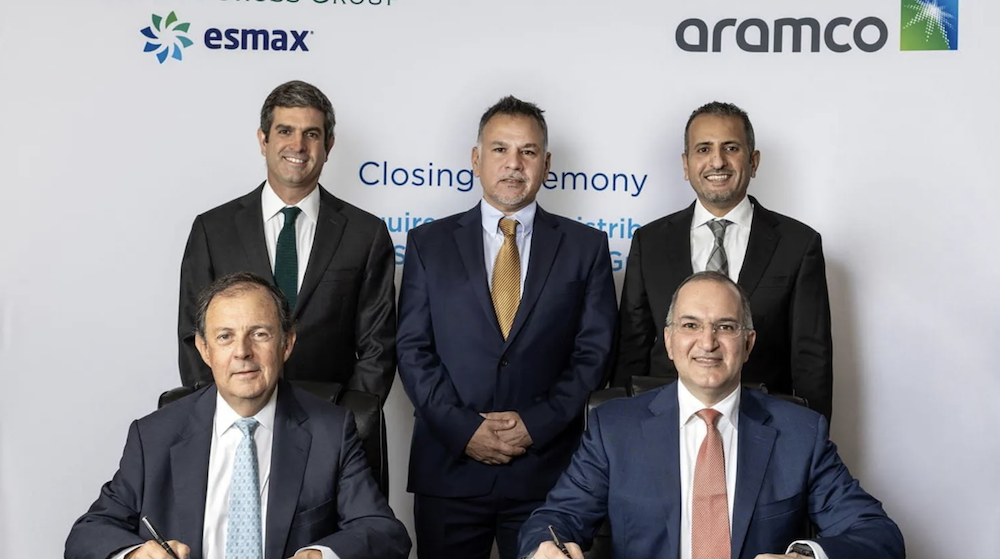 Pictured at the transaction closing are Southern Cross Group Partner Raul Sotomayor, front left, and Aramco Europe President & CEO Mazin Dabbagh, front right. Back row, from left, are Southern Cross Group Partner Jaime Besa, Aramco Vice-President of Retail and Esmax Chairman Ziyad Juraifani, and Aramco International Retail Director Nader Al Douhan. (Aramco)