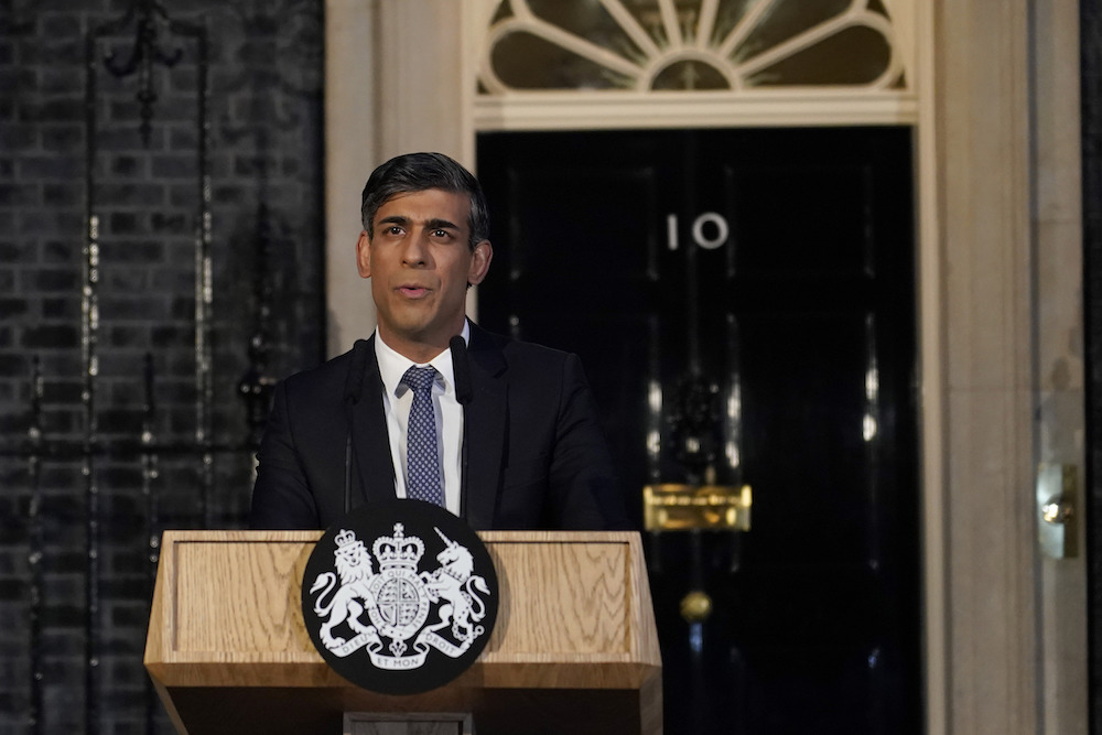 Britain’s Prime Minister Rishi Sunak addresses the media at Downing Street in London, Friday, March 1, 2023. The Prime Minister used the address to warn that democracy is being targeted by extremists. (AP)