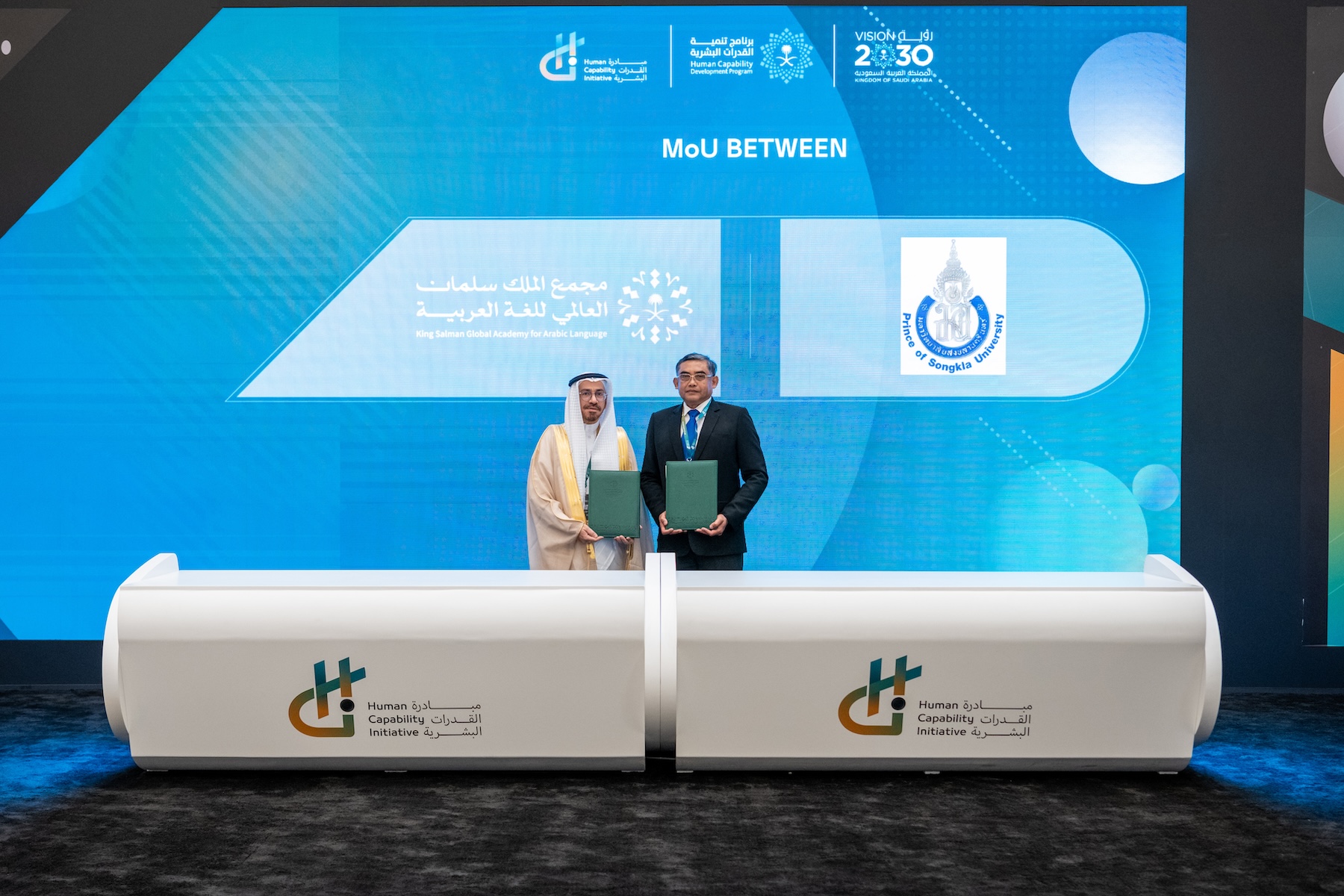 Dr. Abdullah Al-Washmi, the Secretary-General of the King Salman global academy for Arabic Language, and Dr. Niwat Keawpradub, Prince of Songkla University after signing the memorandum of understanding (MoU) in Riyadh (Supplied)