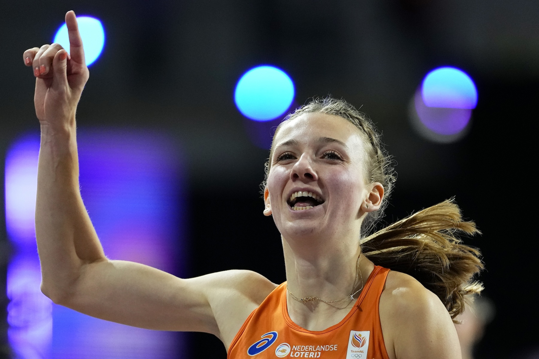 Femke Bol, of the Netherlands, crosses the finish line to win the gold medal and set a new world record in the women's 400 meters during the World Athletics Indoor Championships at the Emirates Arena in Glasgow Saturday. (AP)