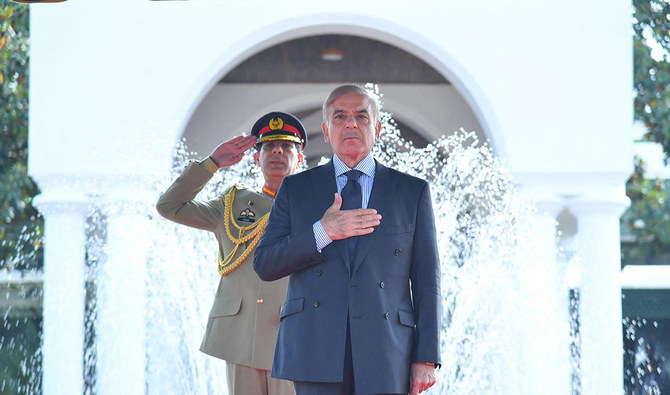 In this handout photograph released by the Press Information Department (PID) on April 12, 2022, Pakistan's Prime Minister Shehbaz Sharif reviews a guard of honor upon his arrival at the Prime Minister's House in Islamabad. (AFP/File)