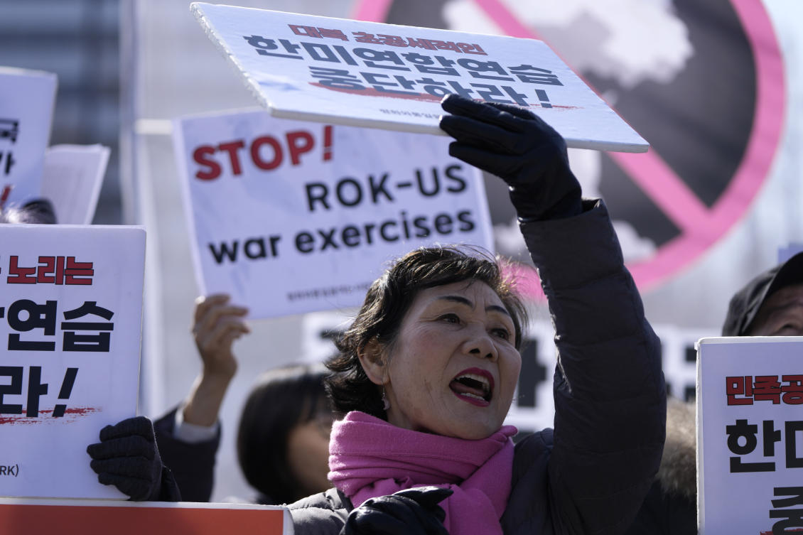 Protesters shout slogans during a rally demanding to stop the joint military exercises between the US and South Korea, in Seoul. (AP)