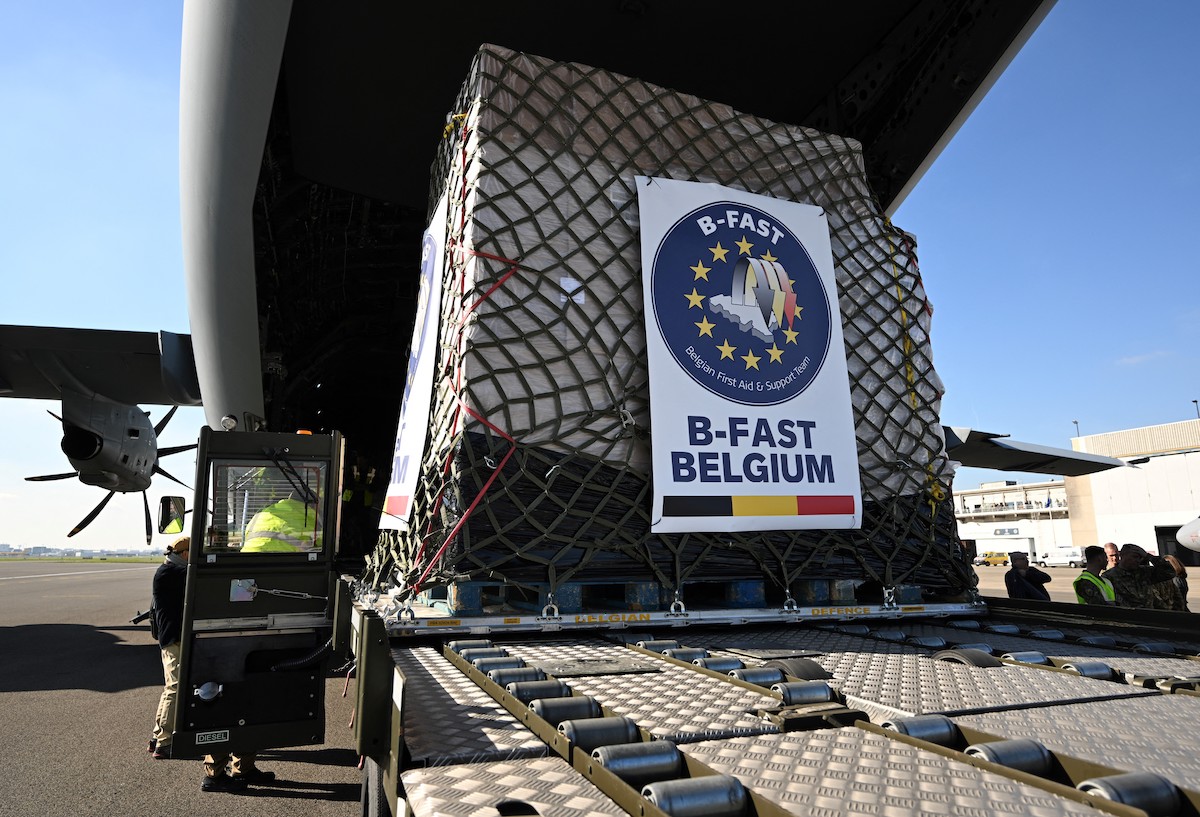 Belgian Air Force soldiers load a military cargo plane with humanitarian aid, that will be dropped over the Gaza strip. (File/AFP)