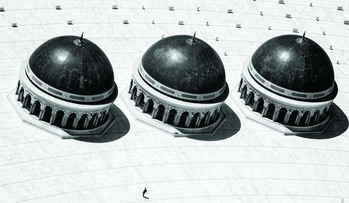 Raed Abdullah Al-Maliki captured an award-winning photo, main, of the Grand Mosque domes from a helicopter during Hajj season, showcasing their size in relation to a solitary figure on the roof. (Supplied)