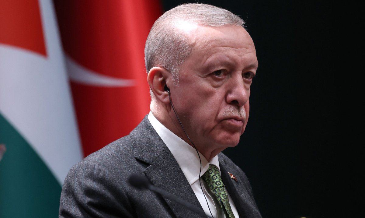 Turkish President Recep Tayyip Erdogan listens as Palestinian leader Mahmud Abbas (not pictured) speaks during a meeting in Ankara, on March 5, 2024. (AFP)