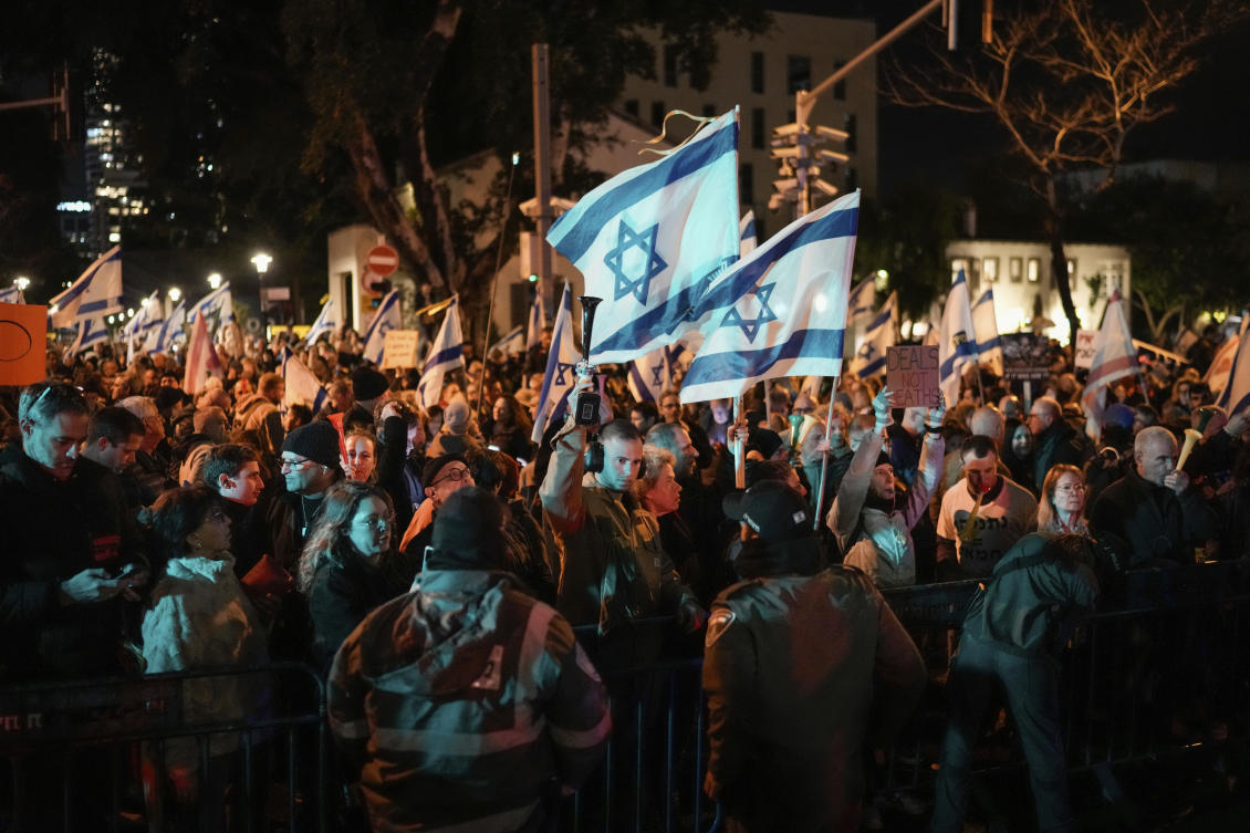 Demonstrators protest against Israeli Prime Minister Benjamin Netanyahu and call for new elections in the latest weekly protest against his handling of the Israel-Hamas war, in Tel Aviv, on Feb. 17, 2024. (AP/File)