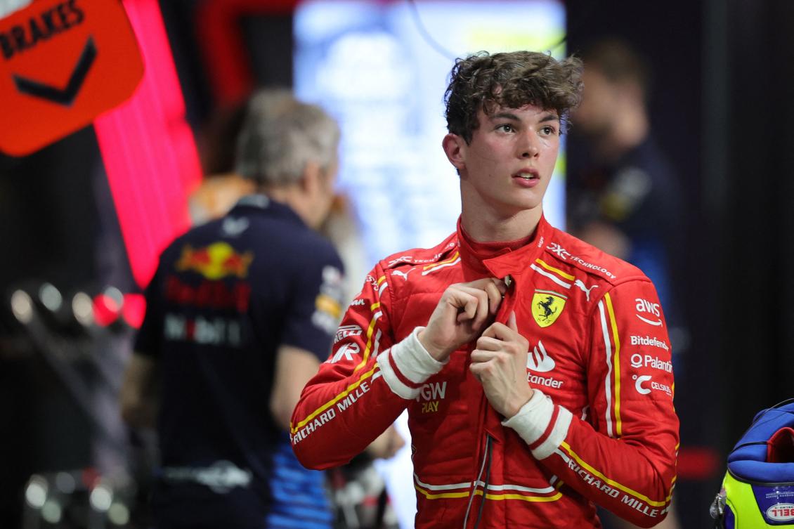 Ferrari’s British reserve driver Oliver Bearman winds stands the garage after the qualifying session of the Saudi Arabian Formula One Grand Prix at the Jeddah Corniche Circuit in Jeddah on Mar. 8, 2024. (AFP)