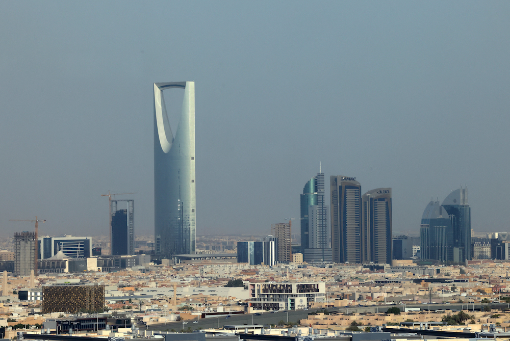 Suspected violations can be reported on the toll-free number 911 in the Makkah and Riyadh regions, and 999 or 996 in other regions of the Kingdom. Above, the Riyadh skyline. (AFP file photo)