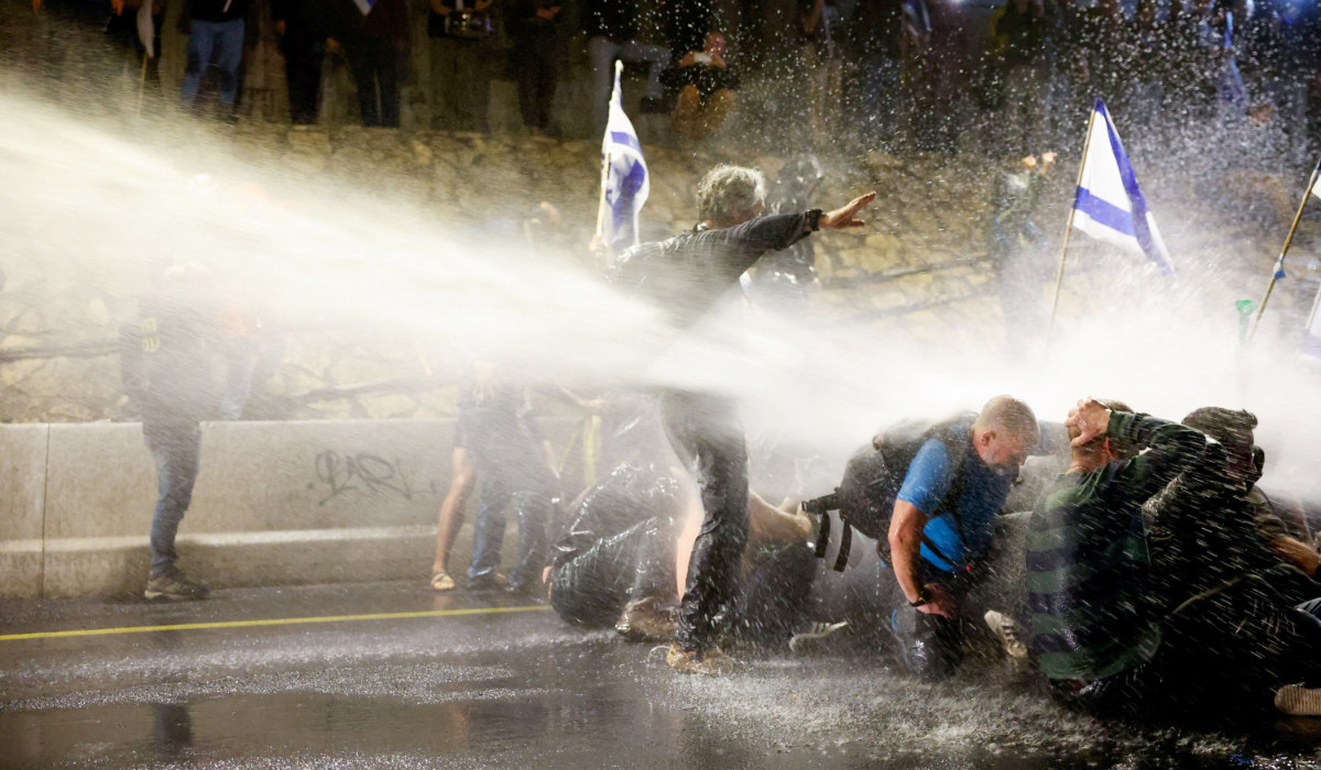 A water cannon is used against demonstrators during a protest calling for the release of hostages kidnapped in the deadly October 7 attack on Israel by the Palestinian Islamist group Hamas from Gaza, in Tel Aviv, Israel, March 9, 2024. (REUTERS)