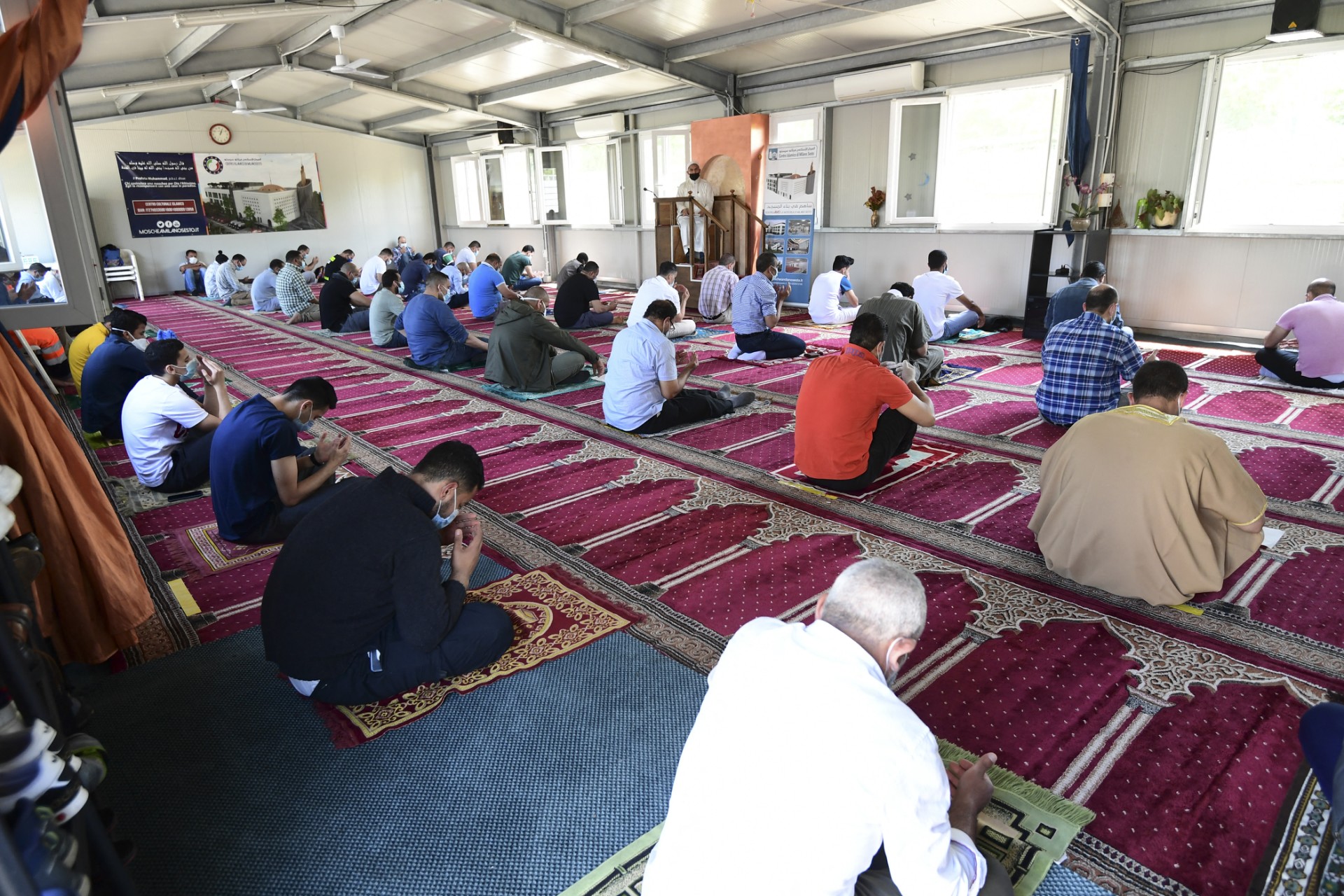 Muslims attend the Friday prayer at a mosque in Milan on June 5, 2020. (AFP)