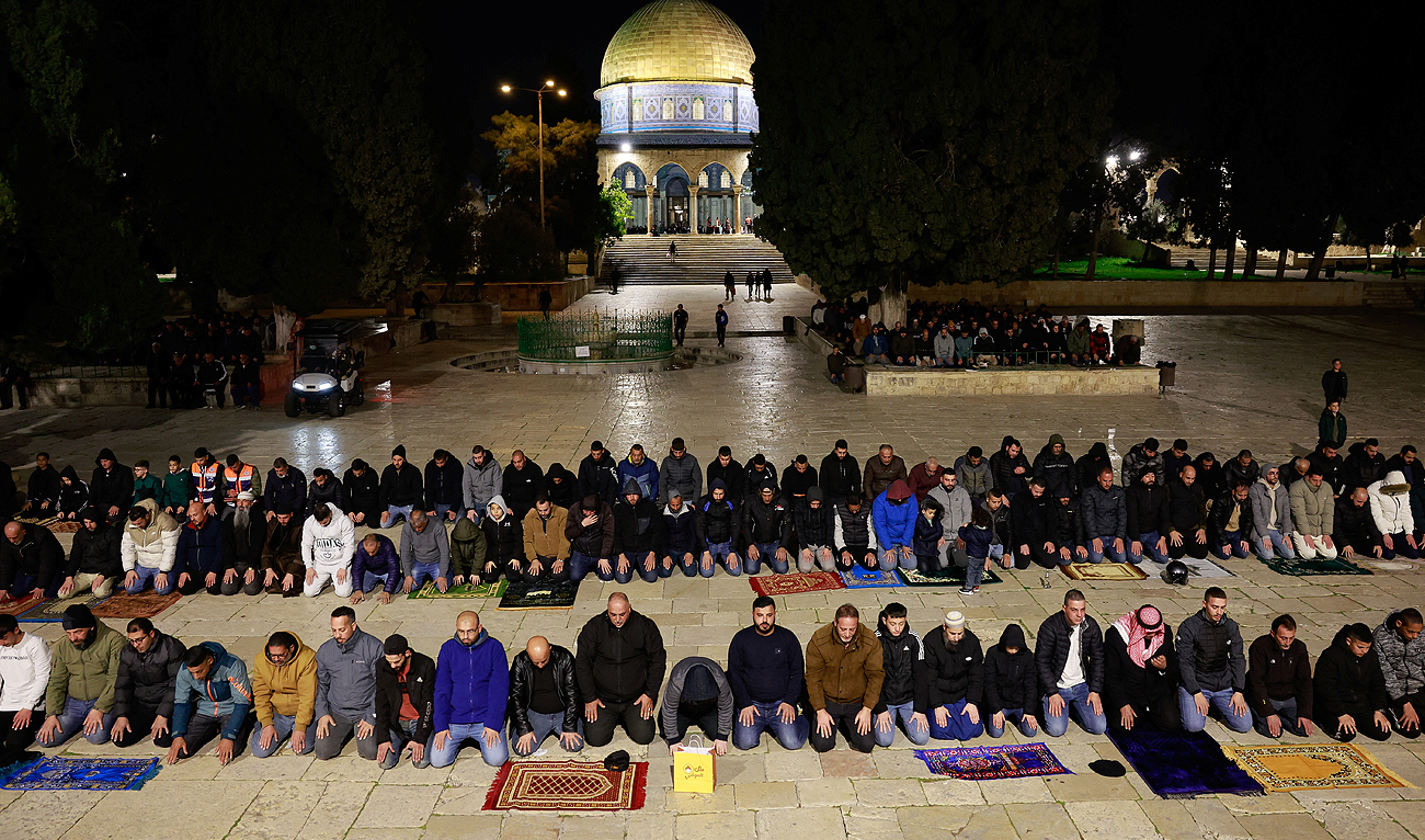 Muslim worshippers take part in the evening ‘Tarawih’ prayers during of the Muslim holy month of Ramadan, at Al-Aqsa compound, in Jerusalem Old City March 10, 2024. (REUTERS)