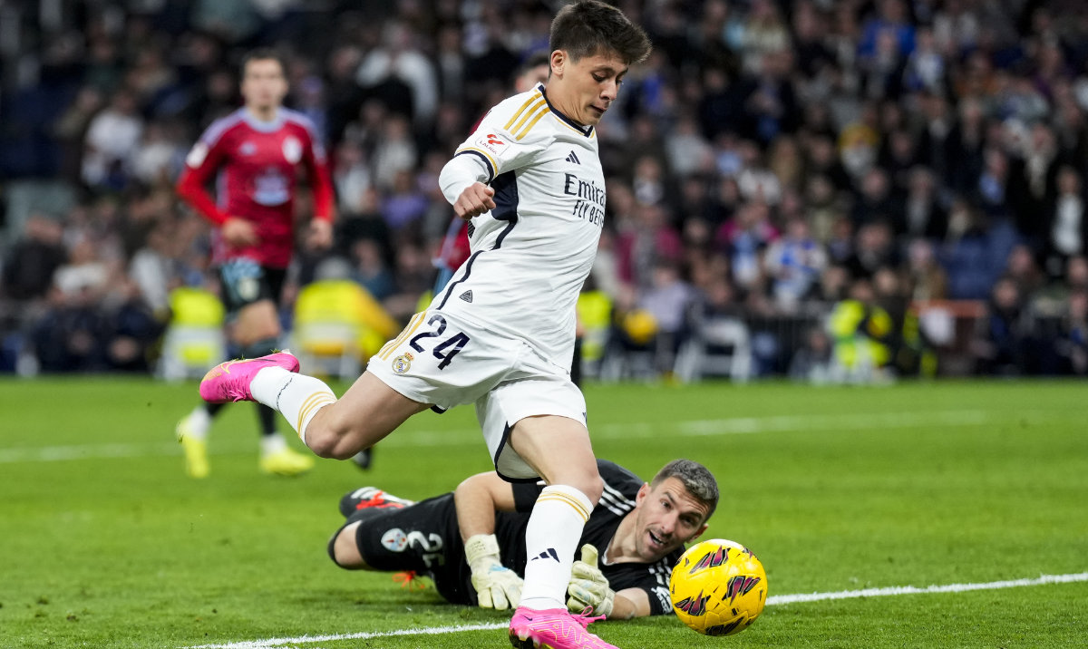 Real Madrid's Arda Guler scores his side's fourth goal the Spanish La Liga soccer match between Real Madrid and Celta Vigo at the Santiago Bernabeu stadium in Madrid on March 10, 2024. (AP)