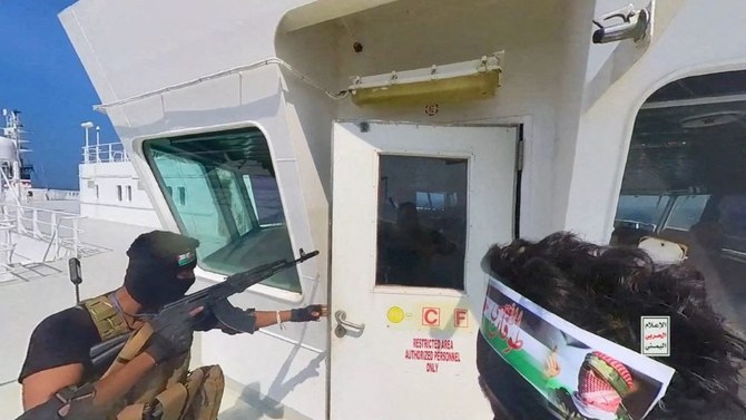 Houthi commandos open the bridge door on the cargo ship Galaxy Leader, Red Sea, Nov. 19, 2023. (Reuters/File Photo)