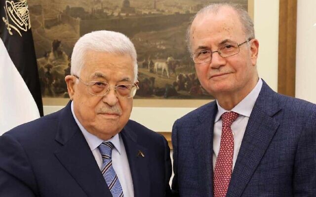 Palestinian Authority President Mahmoud Abbas (L) with Prime Minister-desigate Mohammad Mustafa in Ramallah on March 14, 2024. (WAFA)