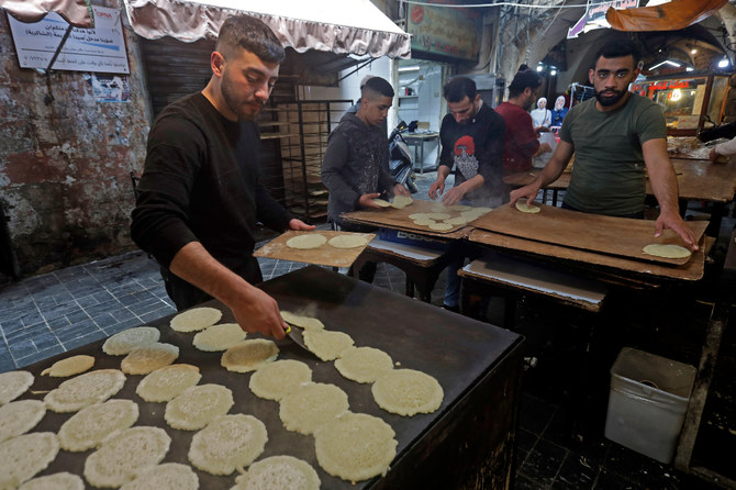 For Muslims, obtaining essential food supplies required for iftar, places additional burdens on many families already facing hardship as a result of the long-running economic crisis in the country, during which the currency has lost about 95 percent of its value. (AFP/File)