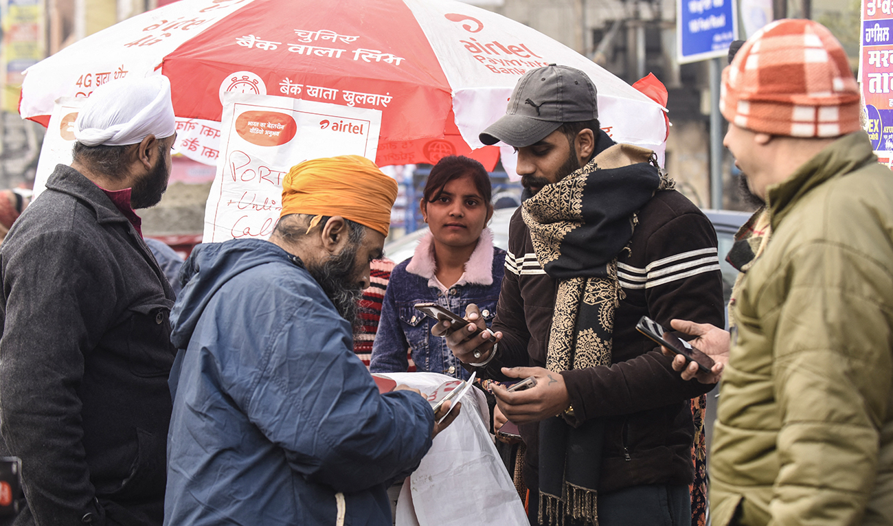 A vendor selling SIM cards at a stall in Amritsar on December 28, 2020. (AFP/File)
