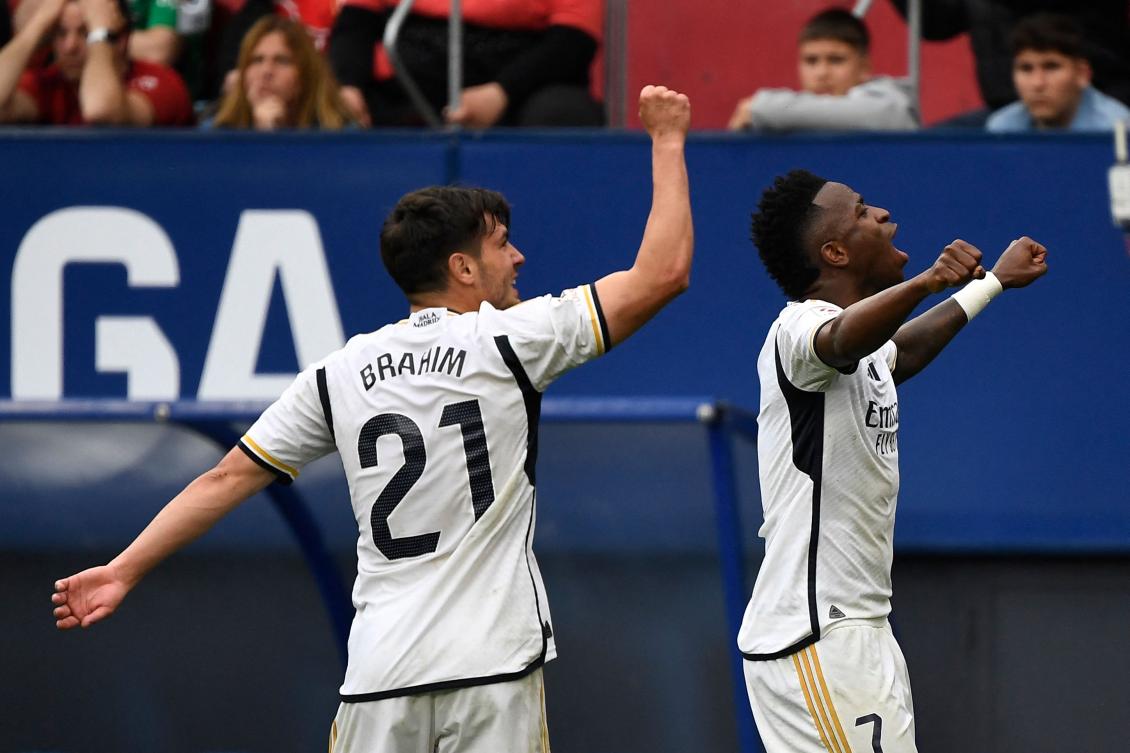 Vinícius scores twice in 4-2 win at Osasuna as Madrid take another step toward title