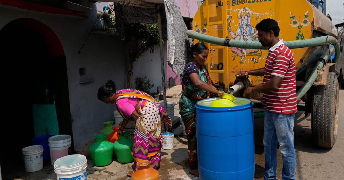 Residents collect portable water from a private tanker in Bengaluru, India on Monday, March 11, 2024. (File/AP)