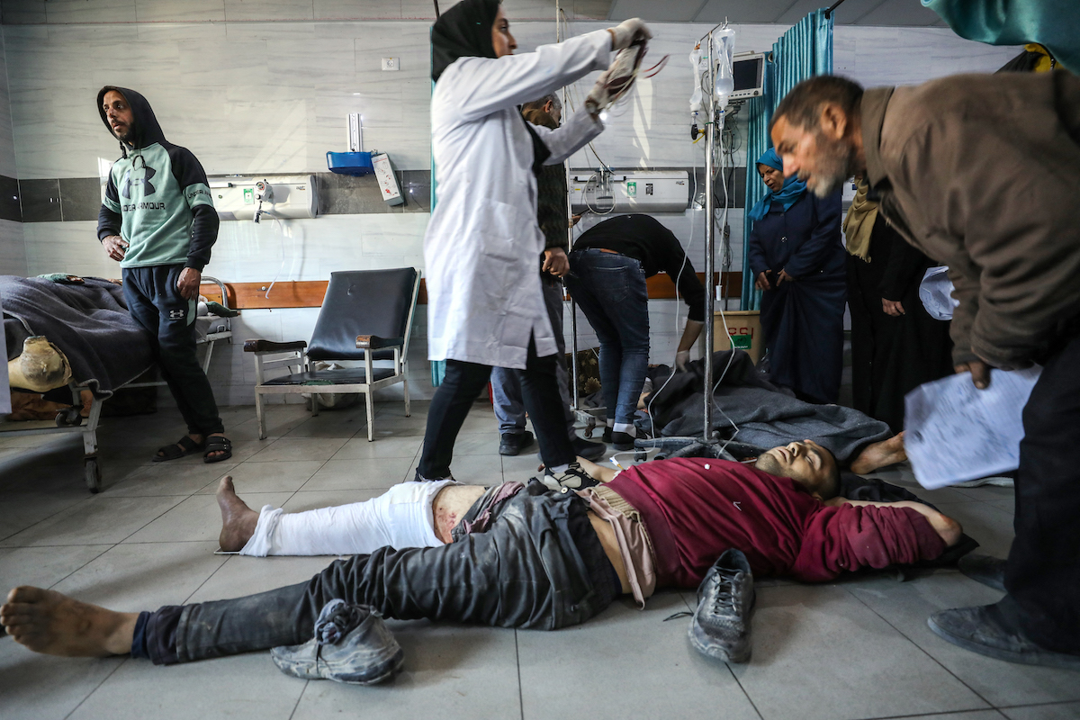 Palestinians receive medical care at Kamal Edwan Hospital in Beit Lahia, in the northern Gaza Strip. (File/AFP)