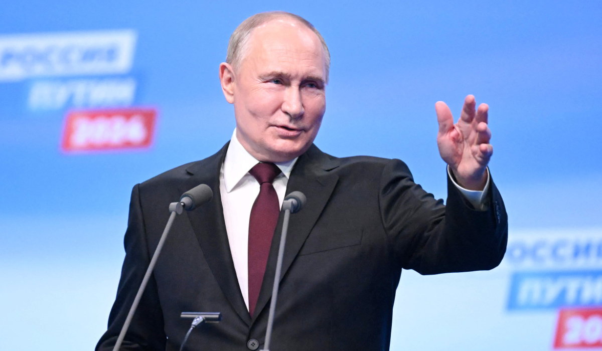 Russian President and presidential candidate Vladimir Putin meets with the media at his campaign headquarters in Moscow on March 18, 2024. (AFP)