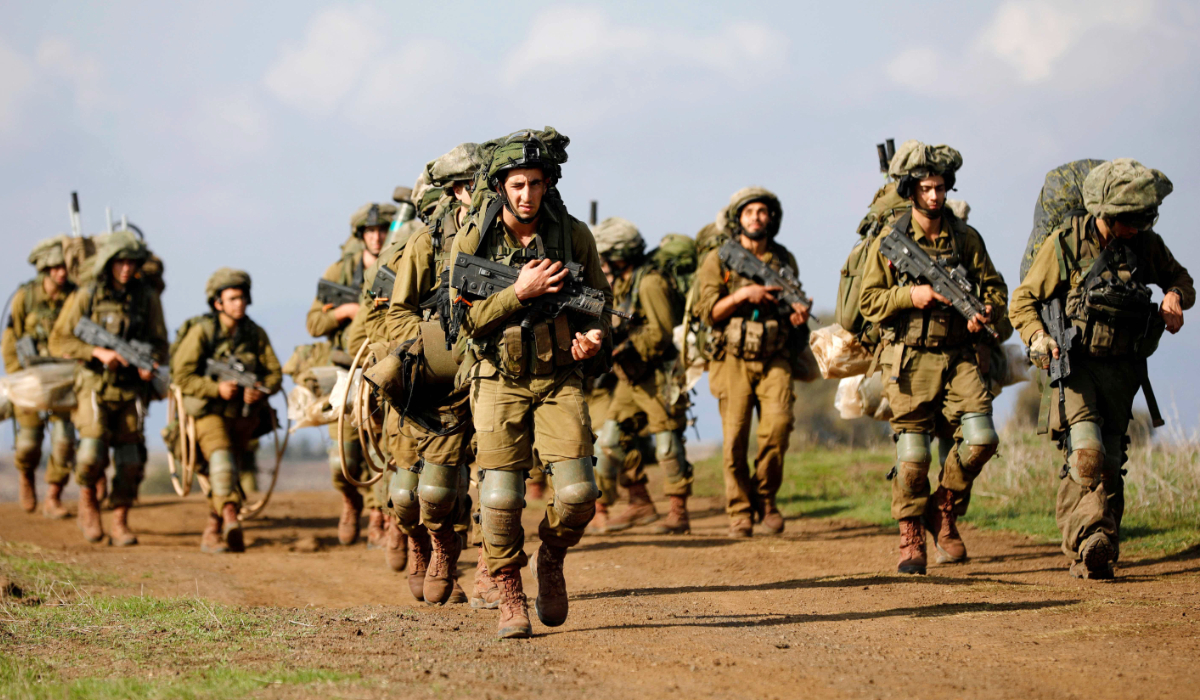 Israeli soldiers take part in a military exercise near the Kibbutz of Merom Golan in the Israeli-annexed Golan Heights. (AFP file photo)