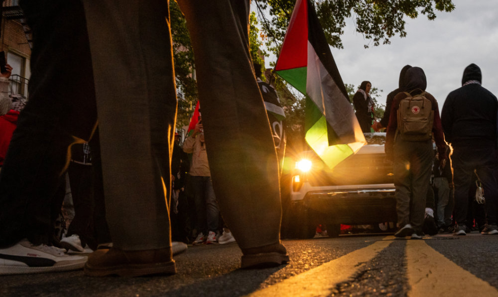 Demonstrators rally in support of Palestinians in Gaza along Steinway Street in the Astoria neighborhood of the Queens borough of New York City. (AFP/File)