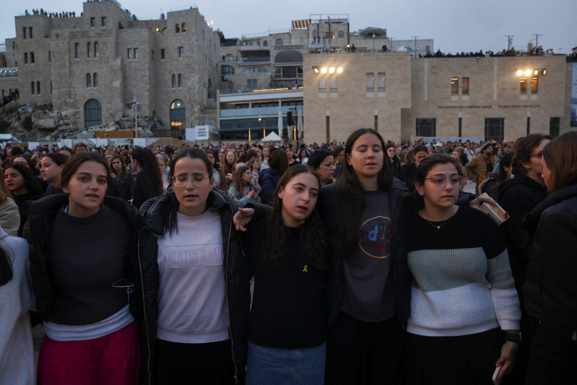 People take part in a mass prayer for the release and wellbeing of hostages kidnapped in the deadly Oct. 7 attack by Palestinian Islamist group Hamas from Gaza, ahead of the Jewish holiday of Purim, at the Western Wall in Jerusalem on Mar. 21, 2024. (Reuters)