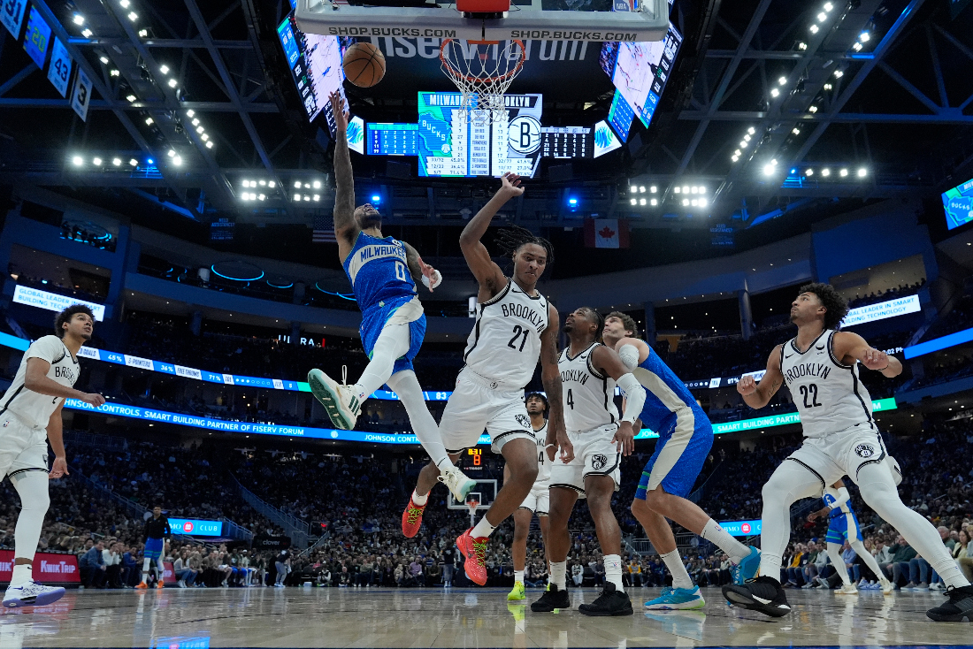 Milwaukee Bucks' Damian Lillard shoots in front of Brooklyn Nets' Noah Clowney during the second half of an NBA basketball game in Milwaukee. The Bucks won 115-108. (AP)