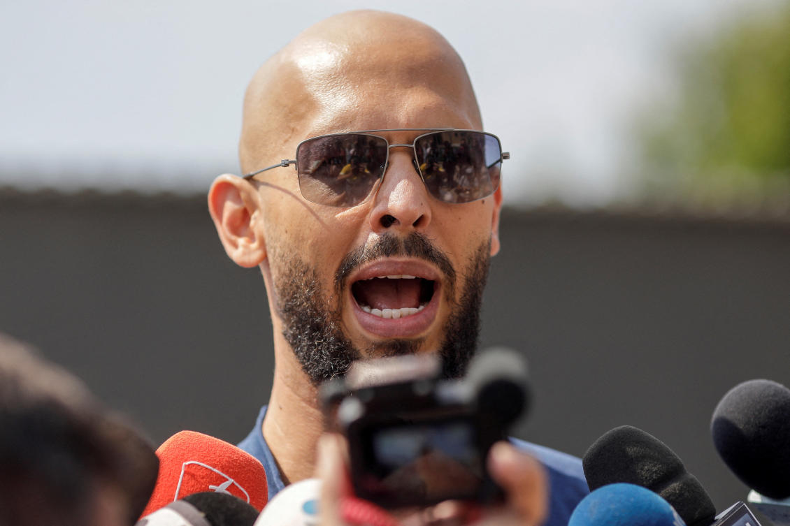 Andrew Tate delivers a press statement outside his house in Voluntari, Ilfov, Romania, in August 2023. (Reuters/File)