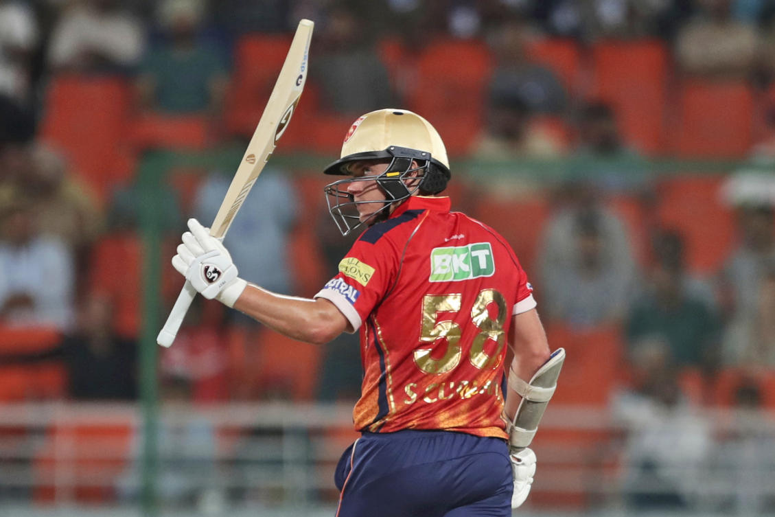 Punjab Kings’ Sam Curran acknowledges his fifty runs during the Indian Premier League cricket tournament match between Delhi Capitals and Punjab Kings in Mullanpur, Punjab, India, Saturday, March 23, 2024. (AP)