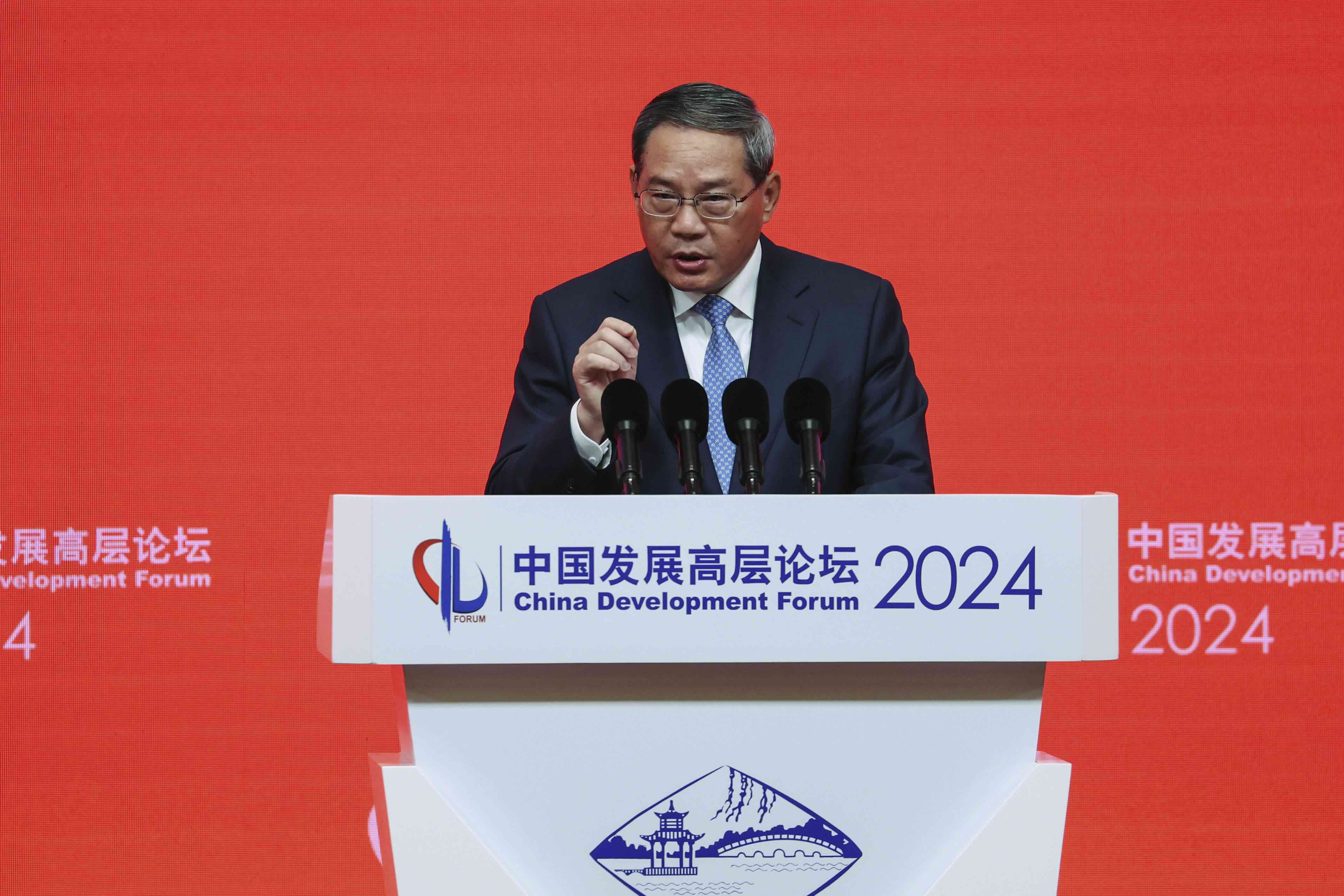 Chinese Premier Li Qiang delivers a keynote speech during the annual meeting of the China Development Forum at the Diaoyutai Guesthouse in Beijing on Sunday. AP