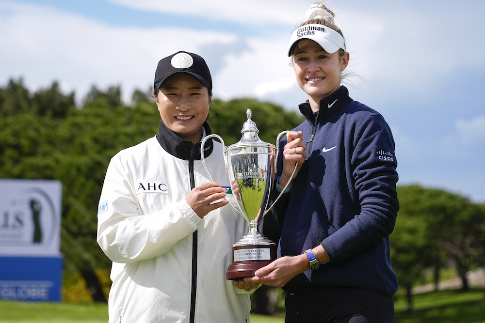 Nelly Korda, right, holds up the trophy with Seri Pak, left, of South Korea, after winning during the final round of LPGA’s Fir Hills Seri Pak Championship Sunday in Palos Verdes Estates, Calif. (AP)