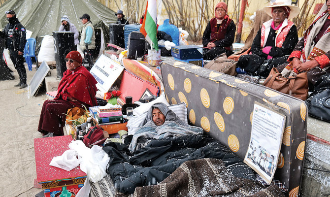 Sonam Wangchuk, an Indian education reformer in Ladakh, is surrounded by supporters on the 17th day of his hunger strike seeking protected status for the region’s people. (AP)