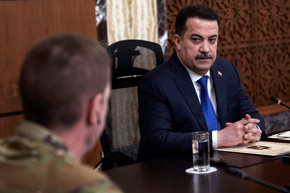 Iraqi Prime Minister Mohamed Shia al-Sudani chairs a meeting with top-ranking officials of the Iraqi armed forces and of the US-led coalition during the first round of talks on the future of American and other foreign troops in the country, in Baghdad on January 27, 2024. (File/AFP)