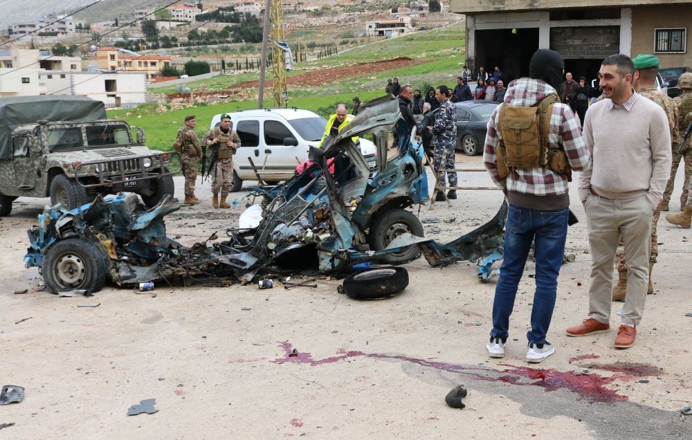 Lebanese soldiers cordon off the site of an Israeli drone attack targeting a vehicle in the town of Souairi, western Bekaa Valley, central Lebanon, Mar. 24, 2024. (AFP)